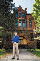 Harry Stinson in front of former Stinson Street School - Hamilton Spectator